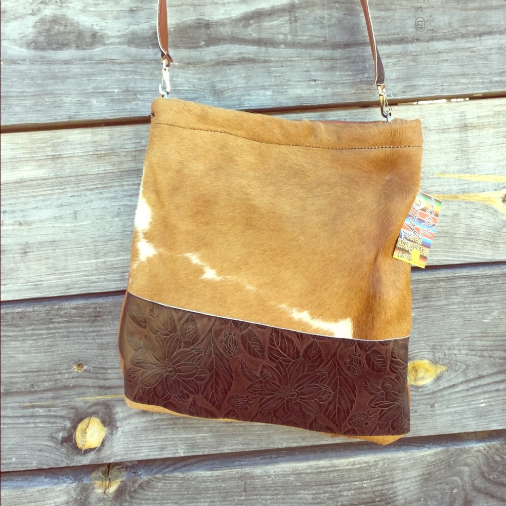 Brown and white spot hair on cowhide purse